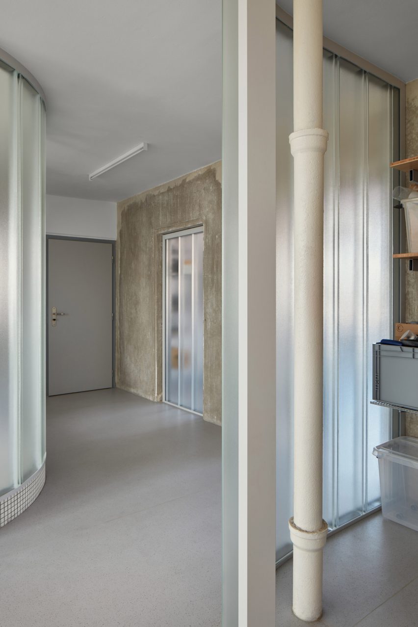Neuhäusl Hunal renovate apartment in Prague using curved glass walls