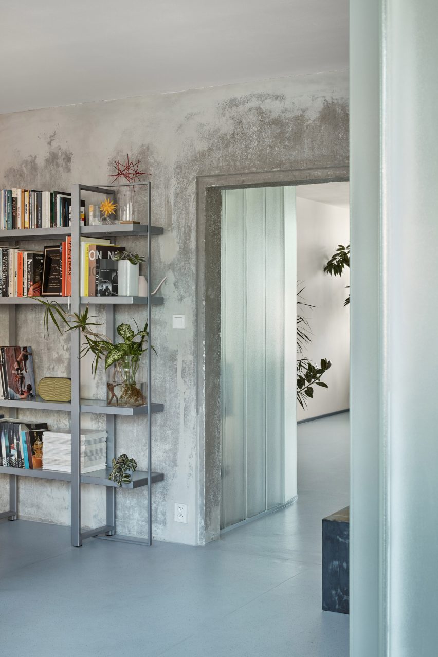 Neuhäusl Hunal renovate apartment in Prague using curved glass walls