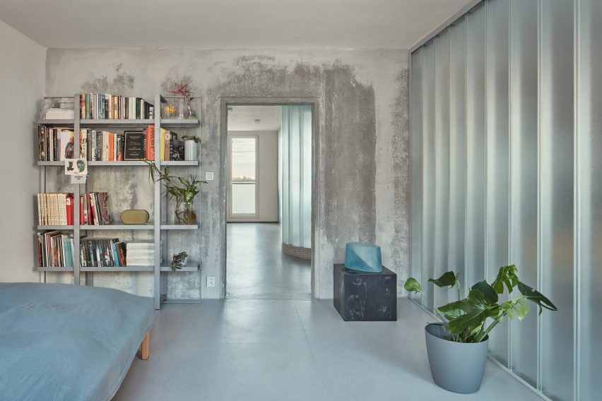 Neuhäusl Hunal renovate apartment in Prague using curved glass walls
