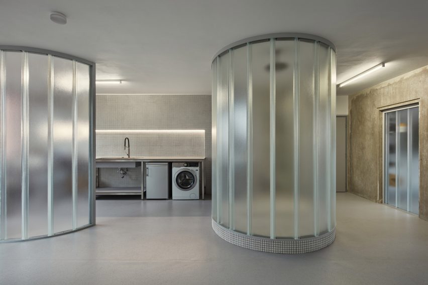 Neuhäusl Hunal renovate apartment in Prague using curved glass walls