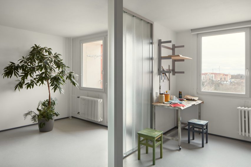 Neuhäusl Hunal renovate apartment in Prague using curved glass walls