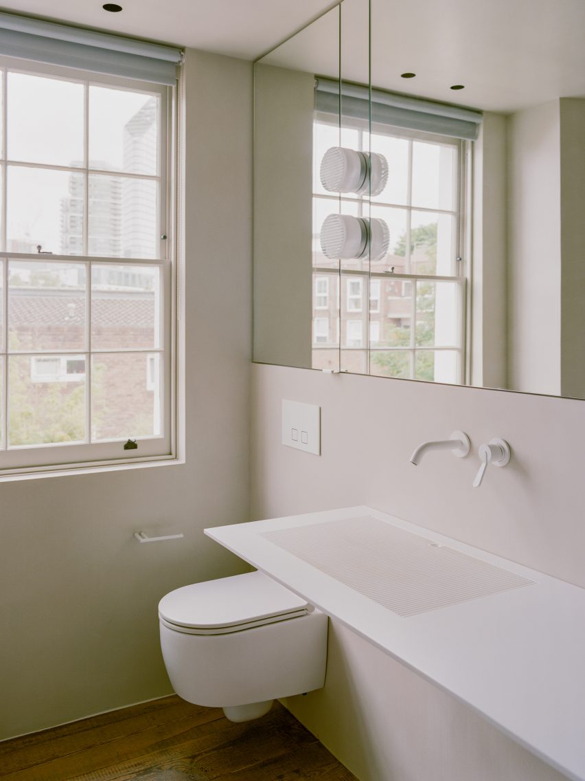 Bathroom with white toilet and sink