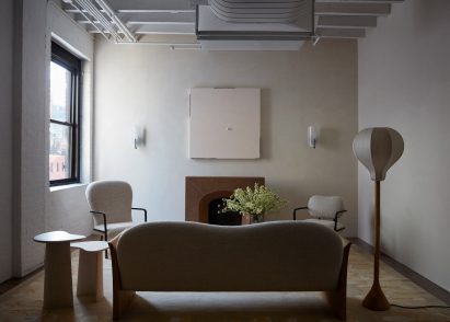 Living room vignette facing a fireplace