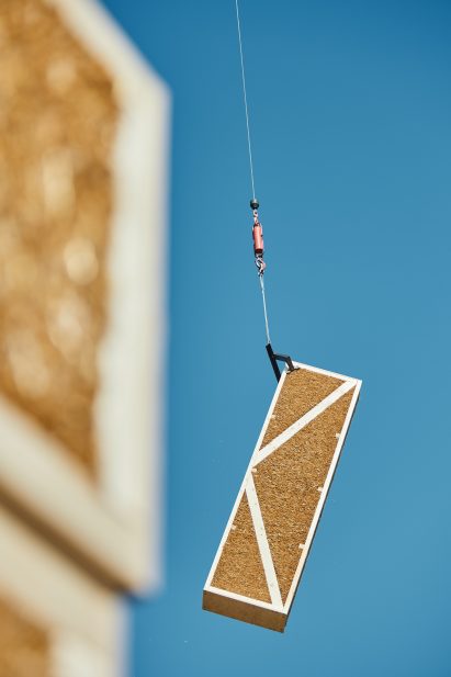 EcoCocon building material being lifted into place on a building site
