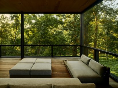 Living space within pine-clad home by Robert Young Architects