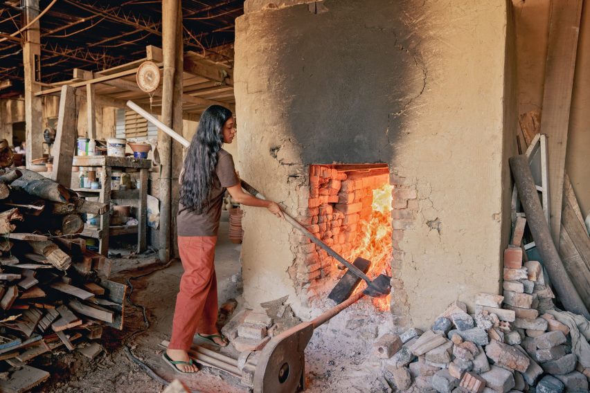 Artist firing clay