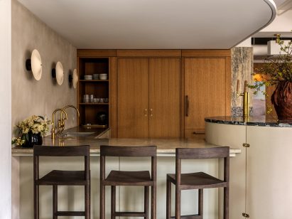 Bar and pantry area with plaster walls and oak millwork