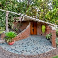 Blurring Boundaries designs brick home nestled in Indian forest