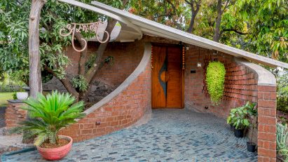 Blurring Boundaries designs brick home nestled in Indian forest