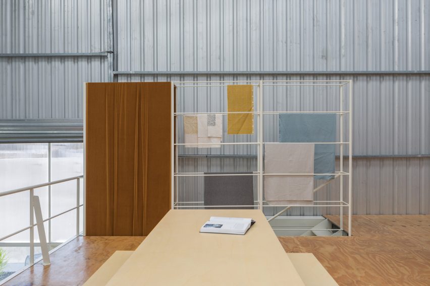 textiles draped over railings