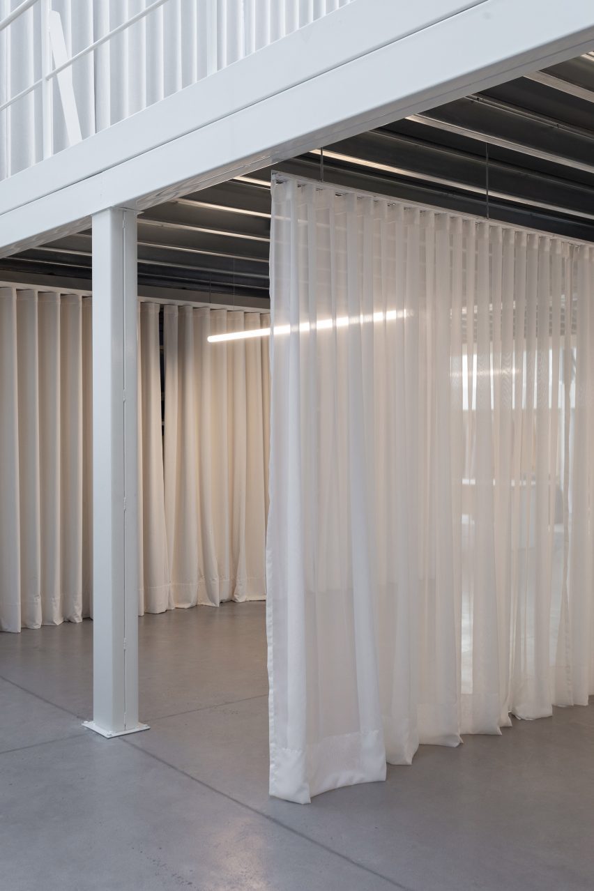 white curtains hanging from ceiling