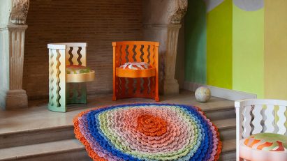 Brightly coloured chairs and a CC-Tapis rug presented in Uchronia's Think Pink installation