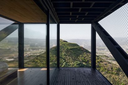Bedroom and terrace at Casa Ladera by WMR Arquitectos