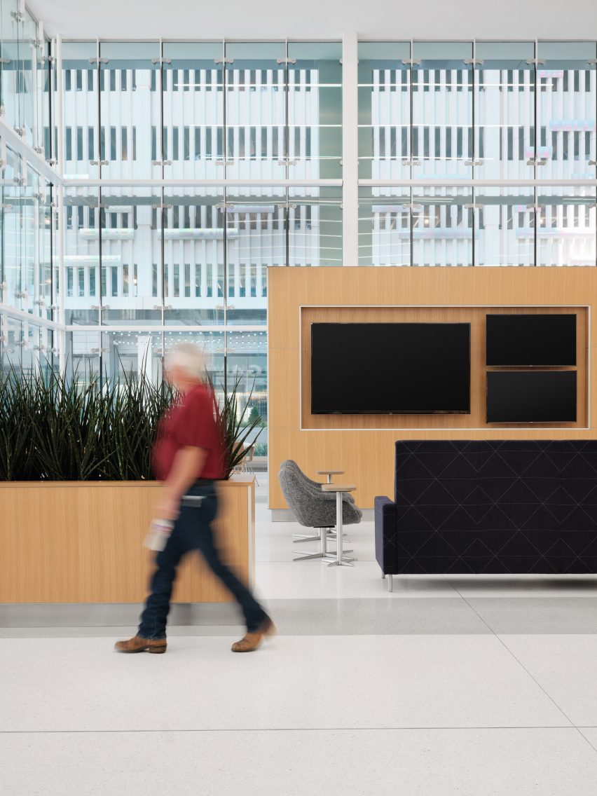 a man walking in a lobby