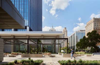 a plaza outside of an oklahoma city skyscrapers