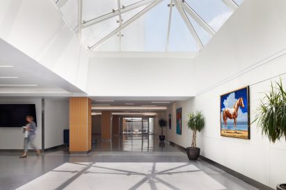 a pyramidal skylight in a lobby