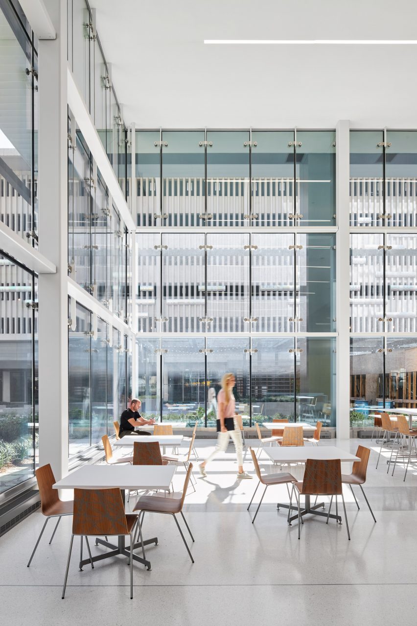 an eating area in a glass building