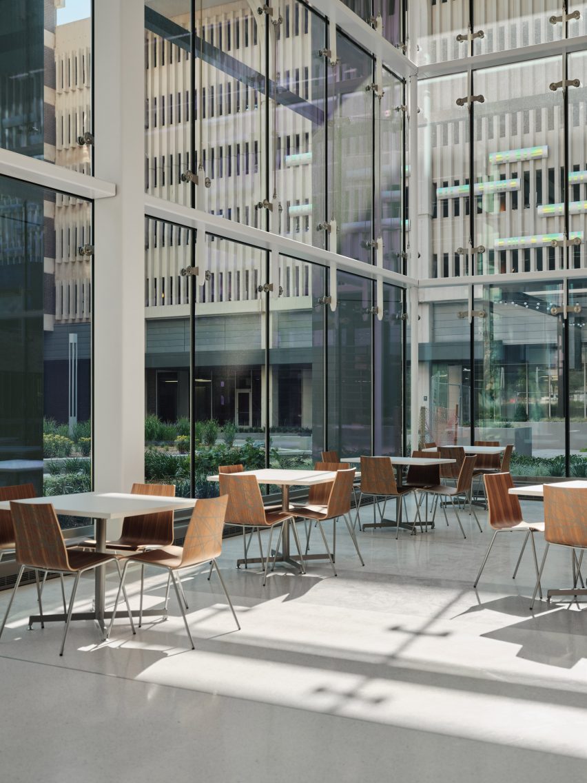 an eating area in a glass building