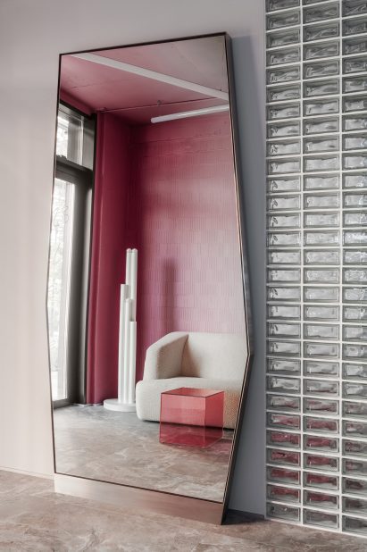 Angled mirror in Ukraine laser clinic interiors by Anastasiia Tempynska
