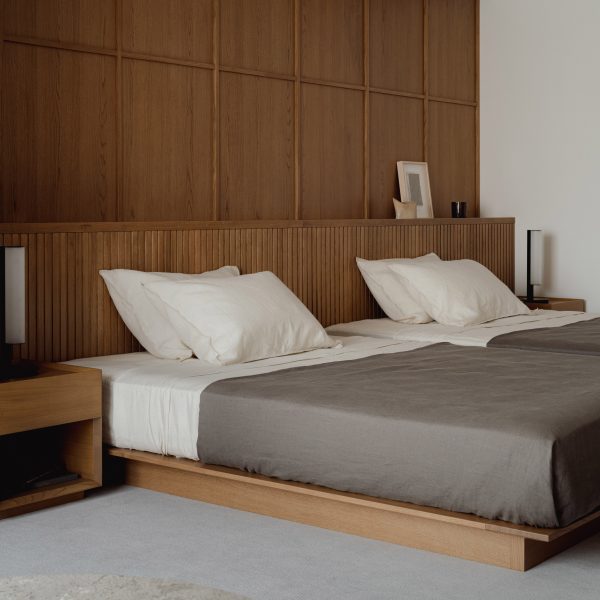 Bedroom interior of minimalist apartment Tokyo by Karimoku Case