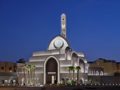 The building exudes a celestial ambiance with its exterior lighting