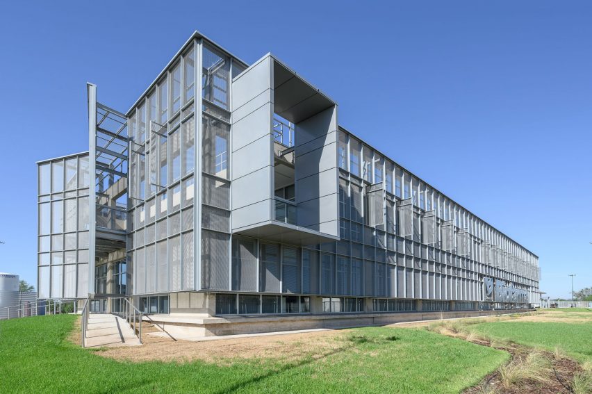 Metallic skin on a long industrial building