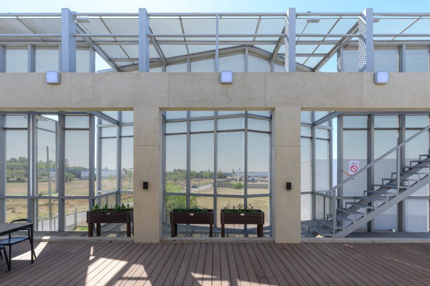 A covered patio of an industrial building