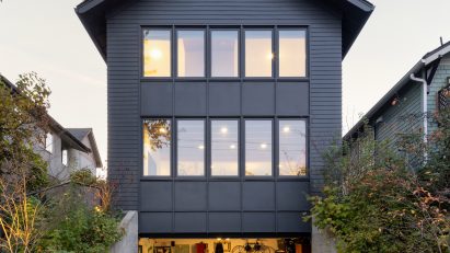 Gabled house with an open garage
