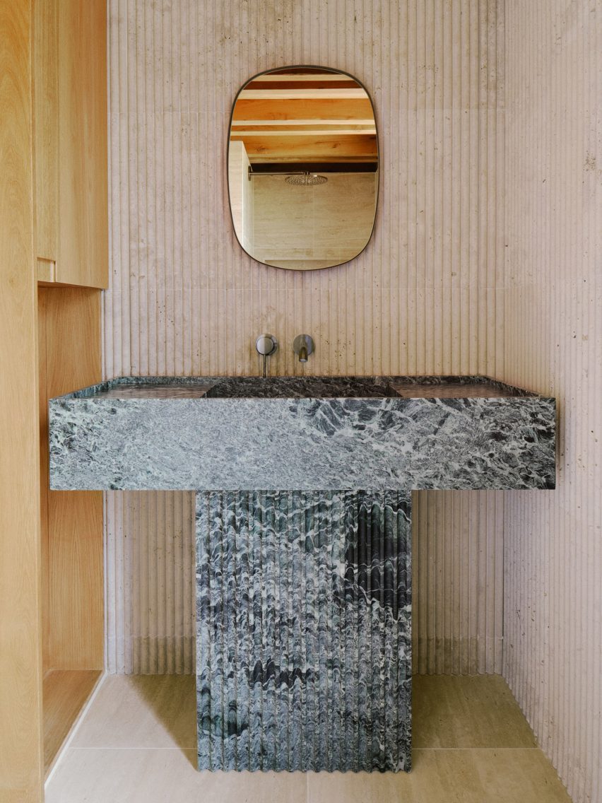 Stone sink in a wood interior