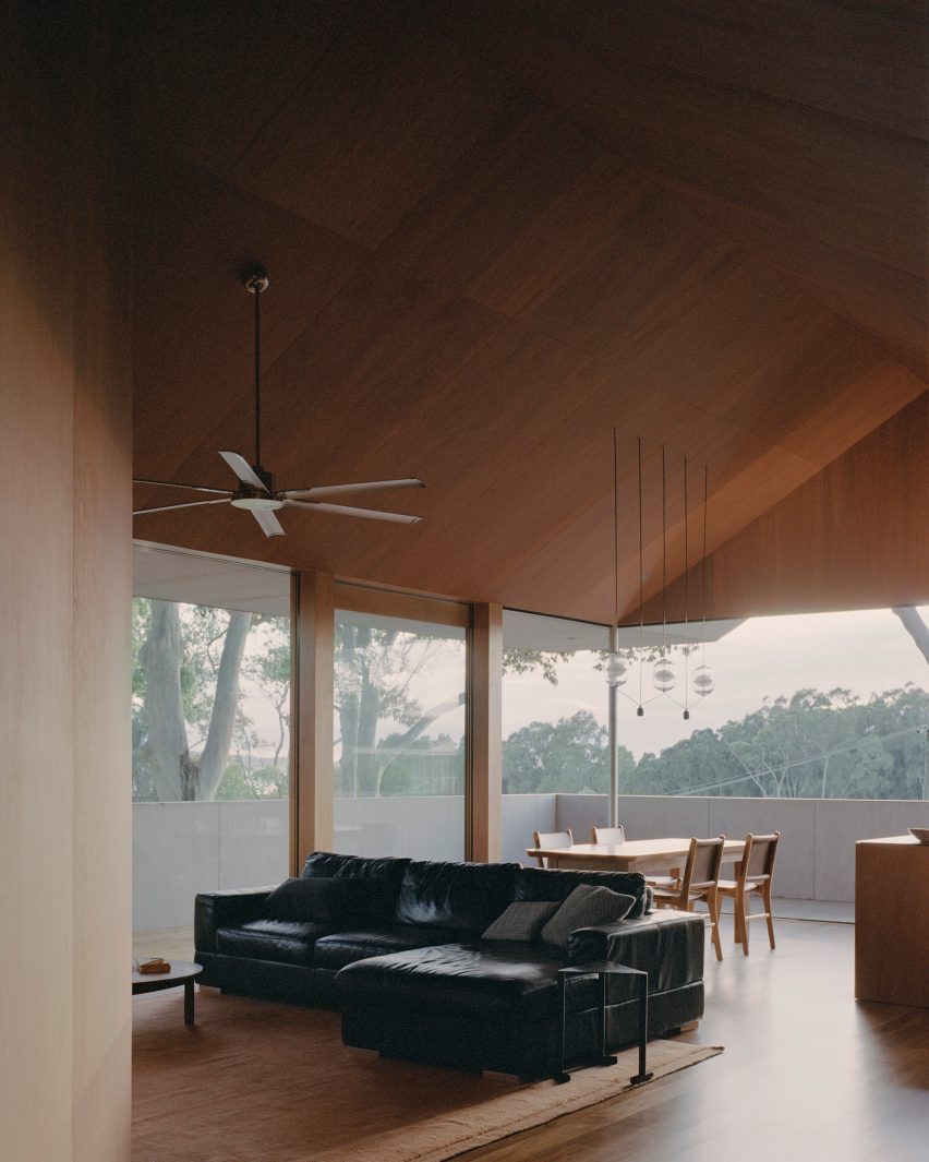 Wood-clad living room of Mossy Point in New South Wales