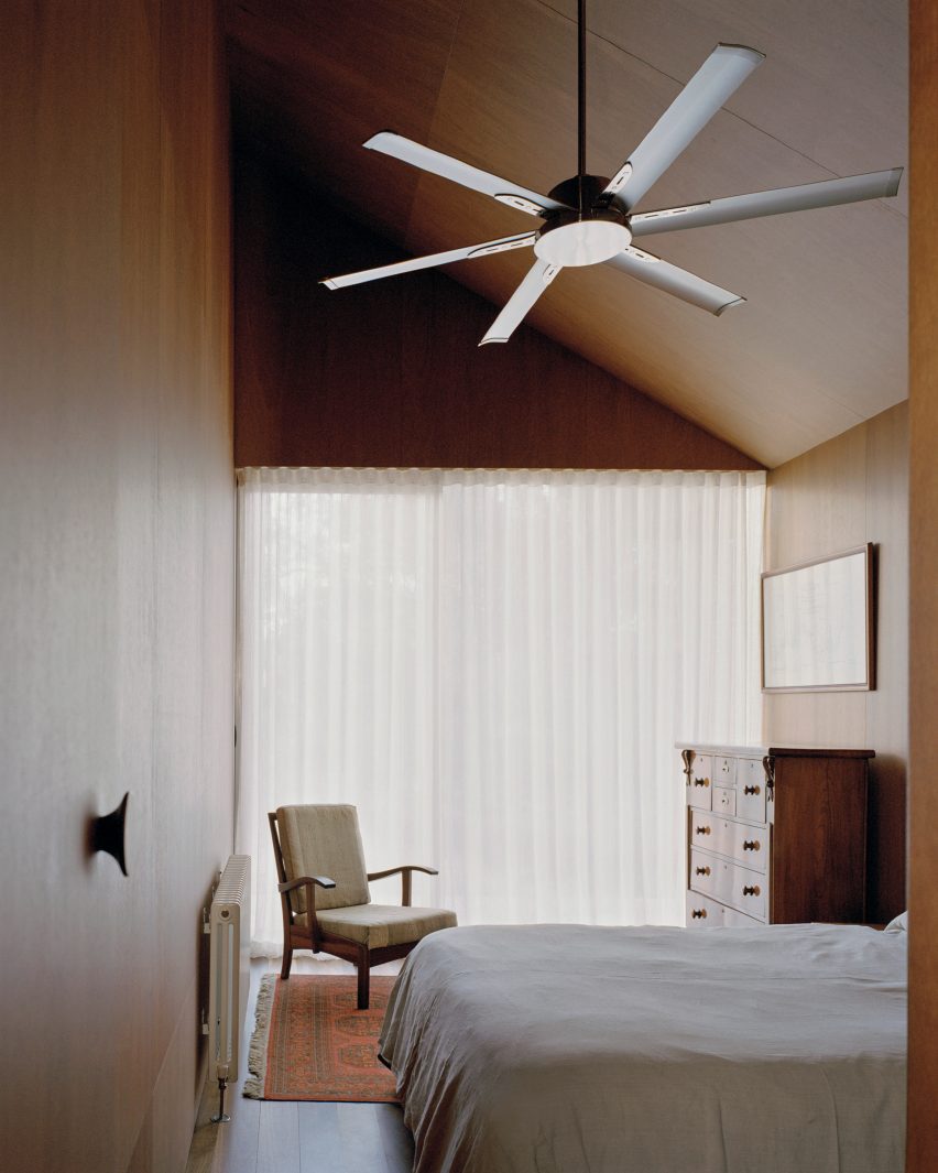 Wood-clad bedroom in Mossy Point in New South Wales