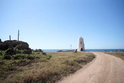 El Faro lighthouse overlooking sea from outside