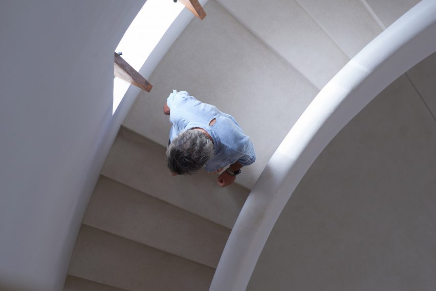 Gonzalo Lebrija on spiral staircase inside lighthouse Mexico