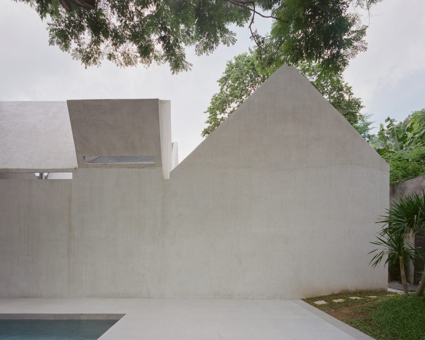 Concrete exterior wall of FR House in the Philippines by CAZA