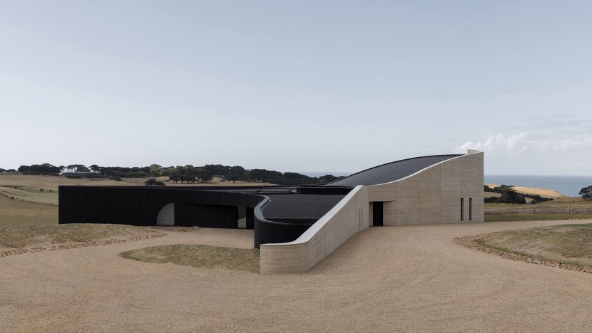 Sculptural rammed earth house in Melbourne by Wood Marsh