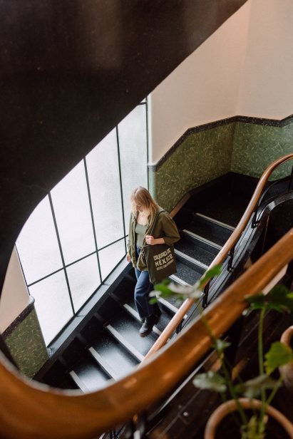 Woman on spiral staircase at Hotel San Fernando