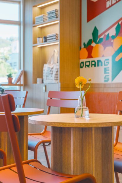 Burnt orange dining chairs and upholstered benches
