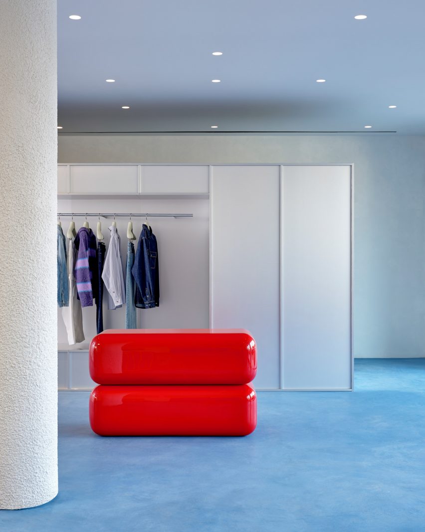 a store with bright red furniture