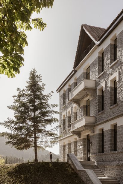 Stone facade of Manna hotel by K-Studio and Mongon
