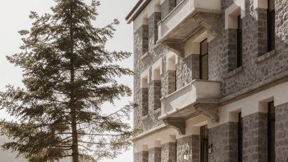Stone facade of Manna hotel by K-Studio and Mongon