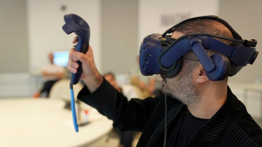a person wearing a pair of VR devices