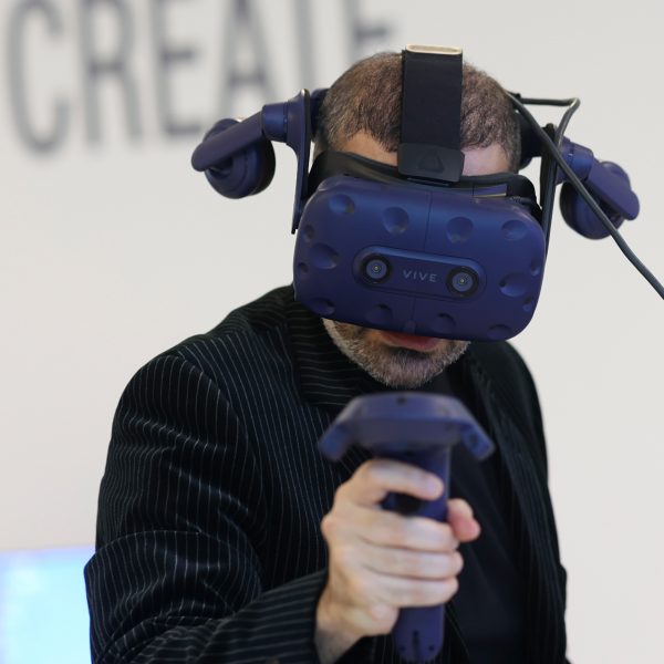a person wearing a pair of VR devices