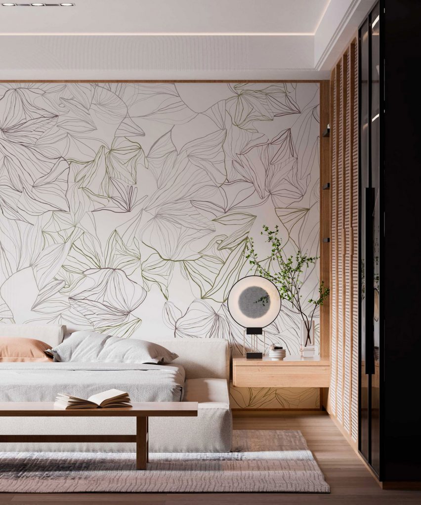 Bedroom with patterned wallpaper behind bed