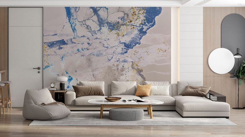 Sofa in front of stone-patterned wallpapered wall