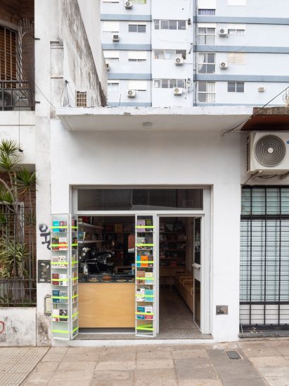 A store facade with books held together with bright green elastic