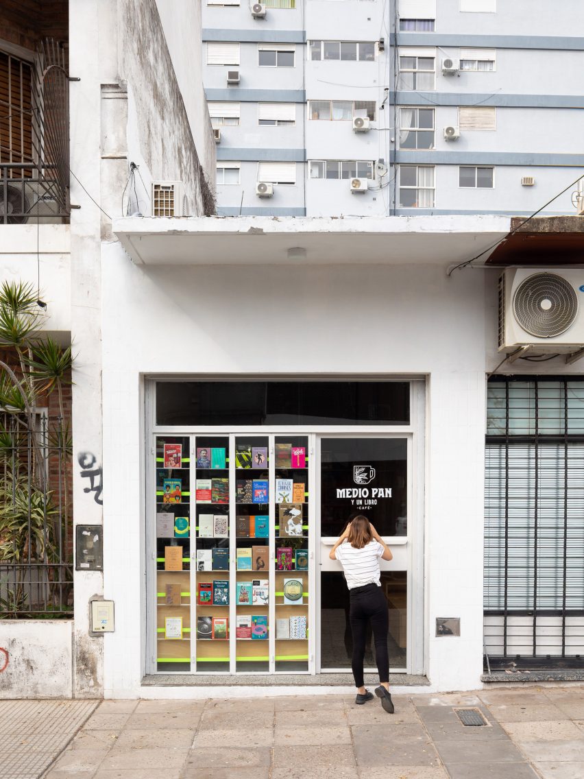 A person looking into a bookshop
