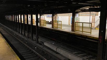 Yellow fences installed by the MTA in New York subway