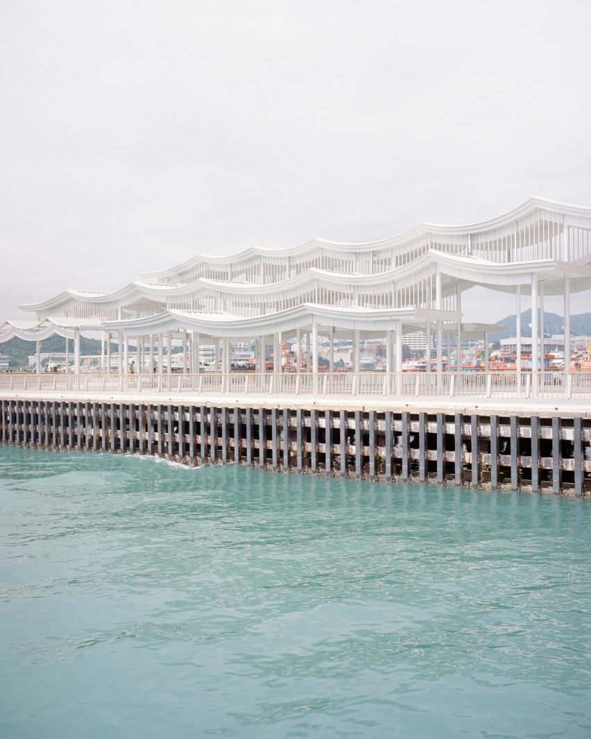 Promenade on a Hong Kong harbour with an undulating roof