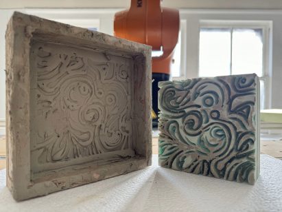 Clay mould with swirling pattern inside