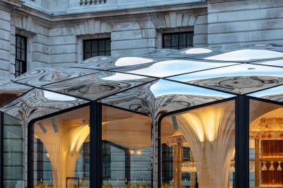 Metal mirror stainless steel roof of pavilion in old war office London